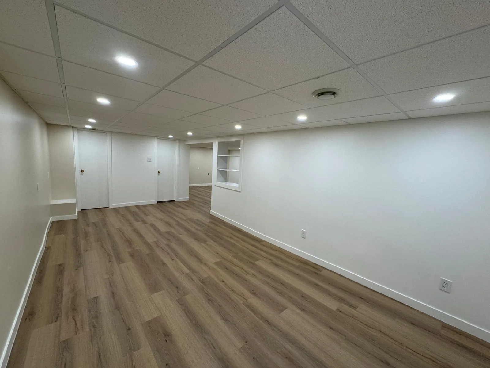 Open basement floor looking back towards the stair