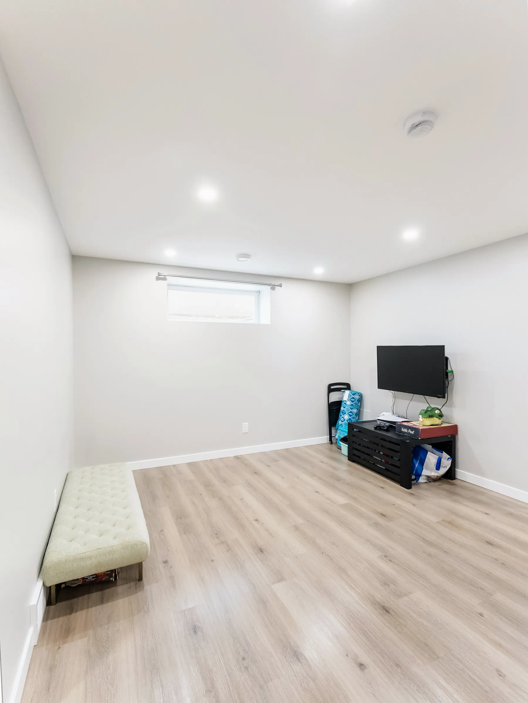 The rec room from the stair end, looking across the open floor