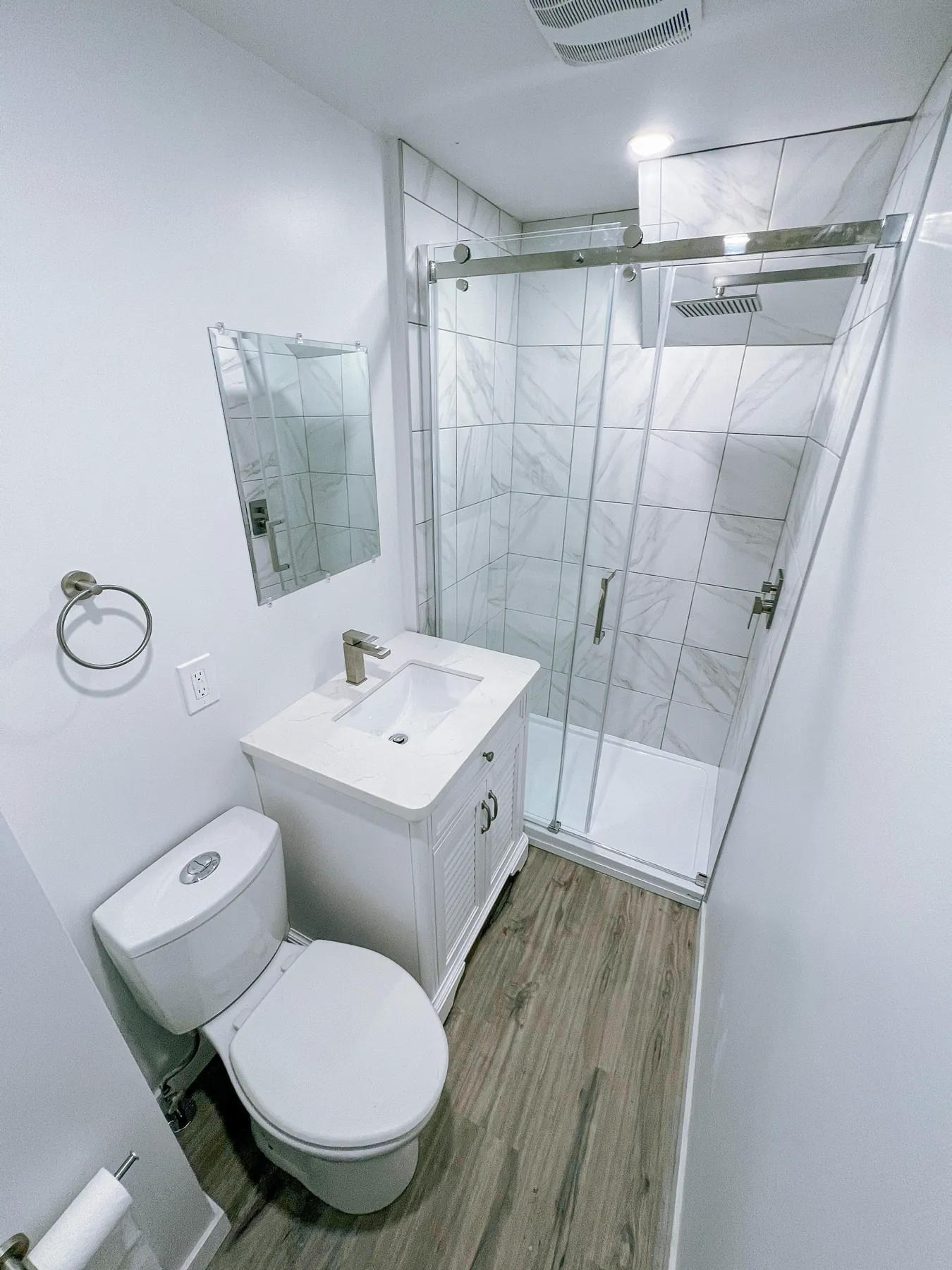 The vanity and shower from the doorway