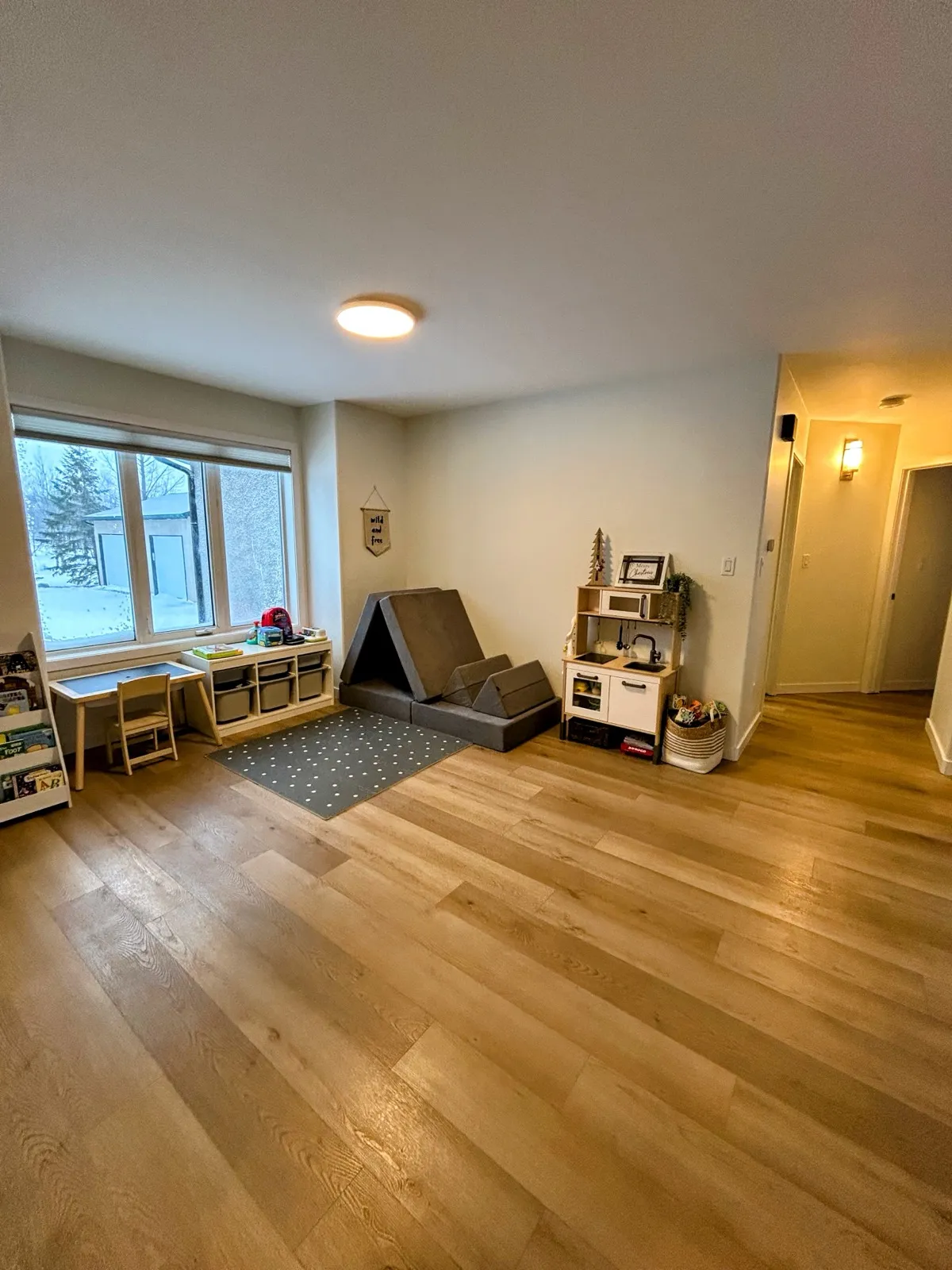The plank floor carried through into the playroom
