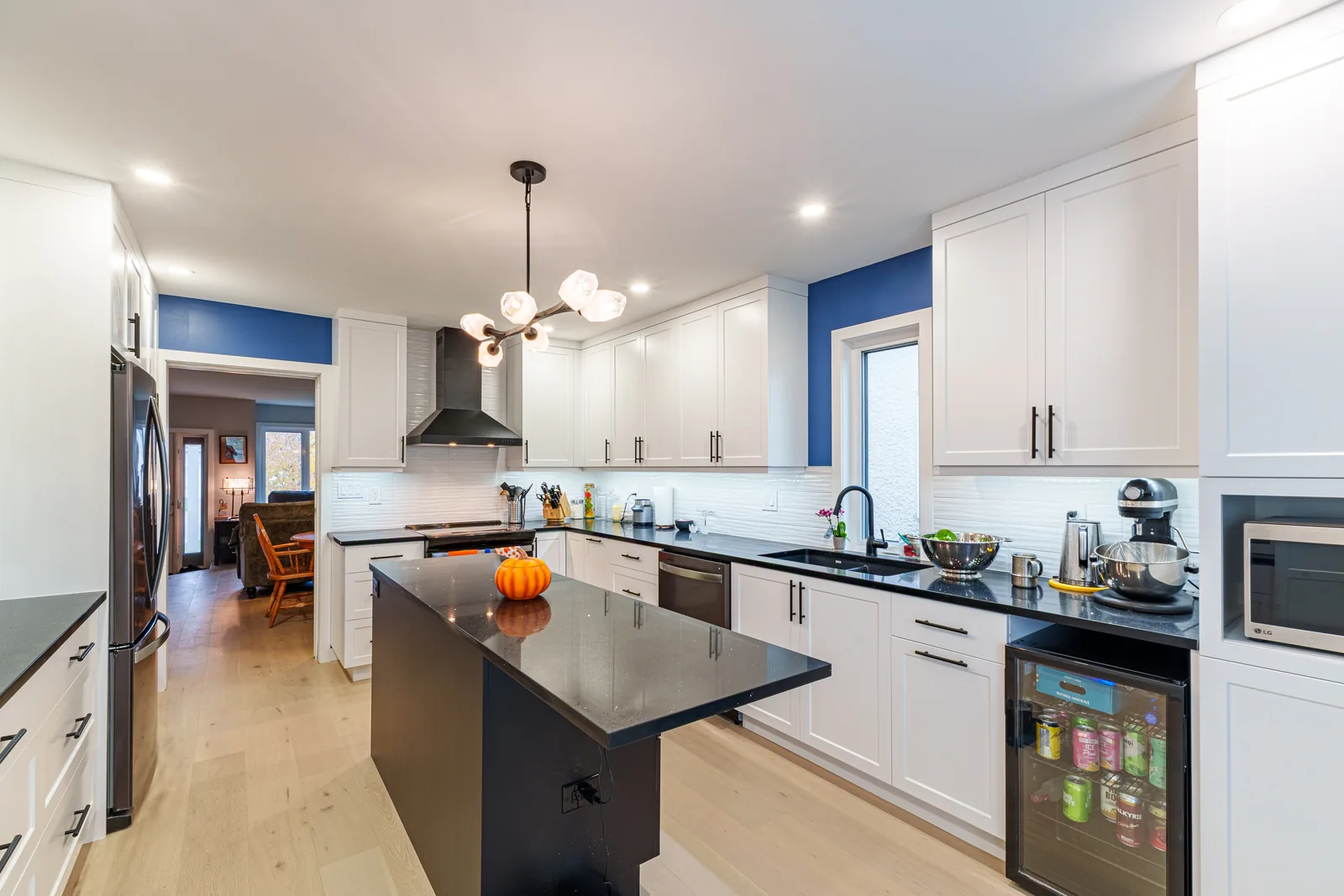 Counter run and island from the dining end, oak floor throughout
