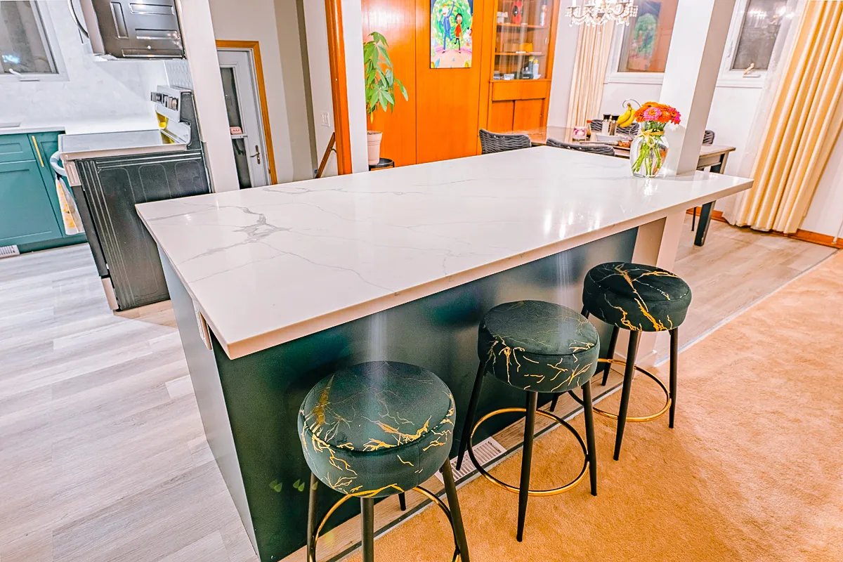 The island and its stools, looking through to the dining room