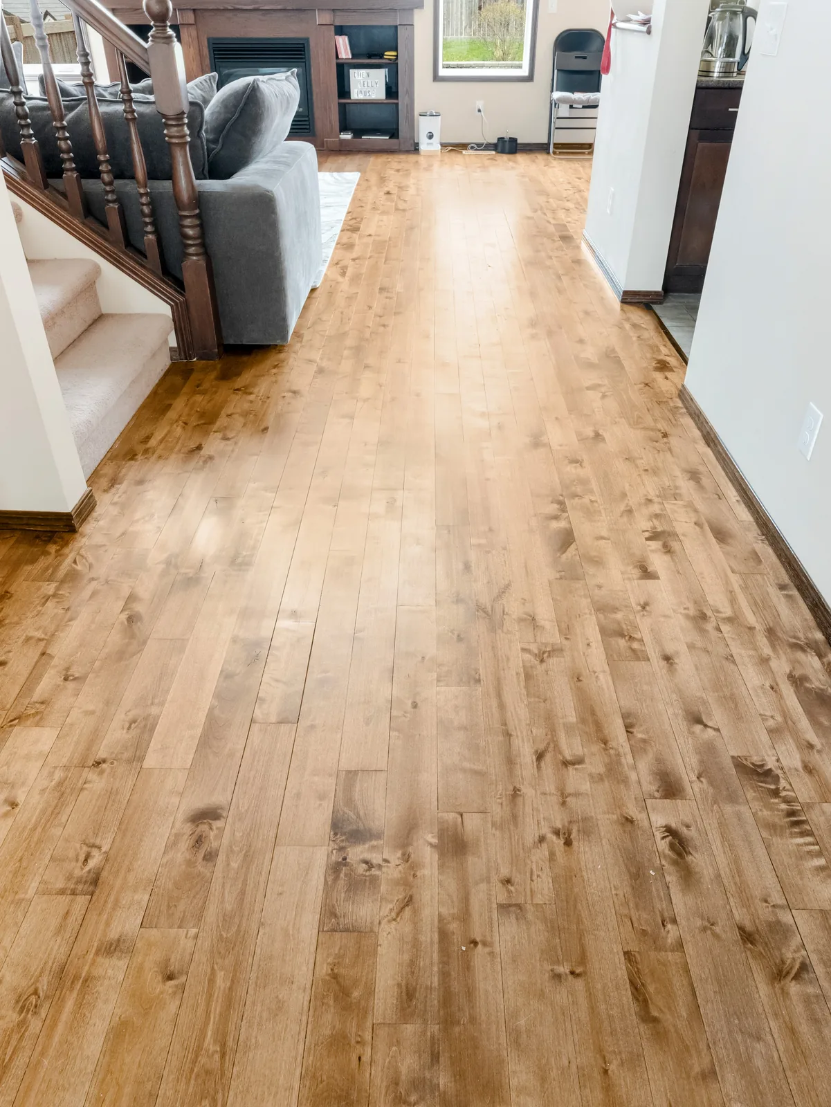 New character hardwood running from the living room through to the kitchen
