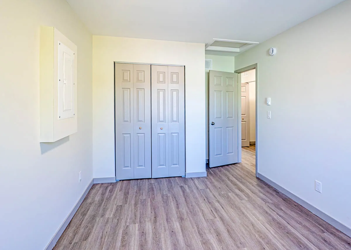 Bedroom with double closet doors