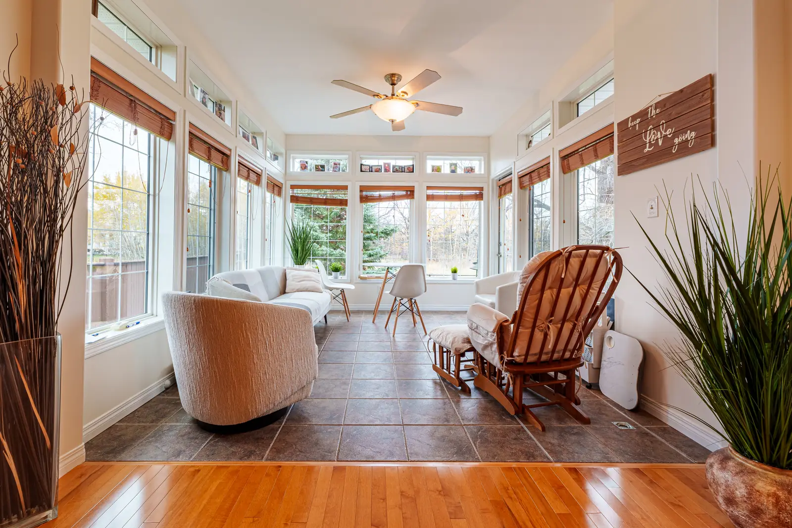 Where the hardwood of the house meets the tile of the new room