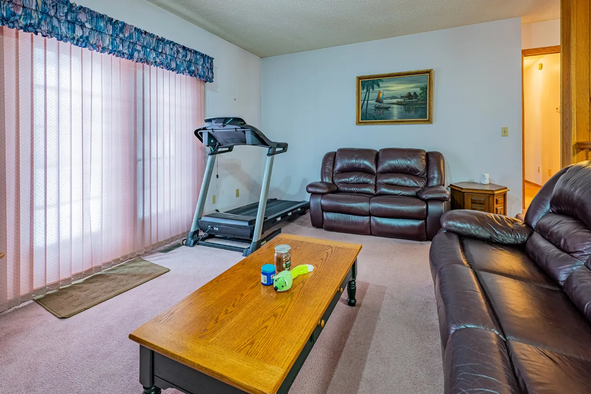 Before: the family room toward the patio doors